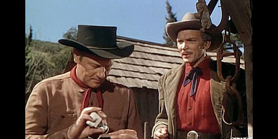 Joel McCrea as Chuck Conner with Phillips, the man who owns the small ranch where the four boys live in Saddle Tramp (1950)