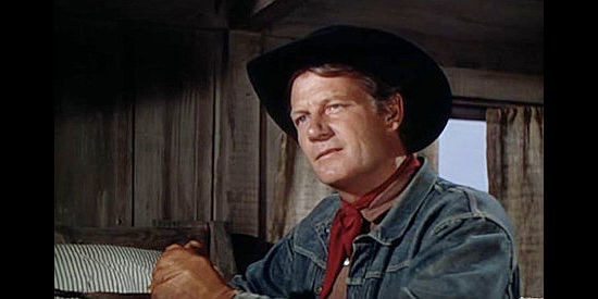 Joel McCrea as Chuck Conner, a man bound for California but forced to take a ranch job because of his growing responsibilities in Saddle Tramp (1950)