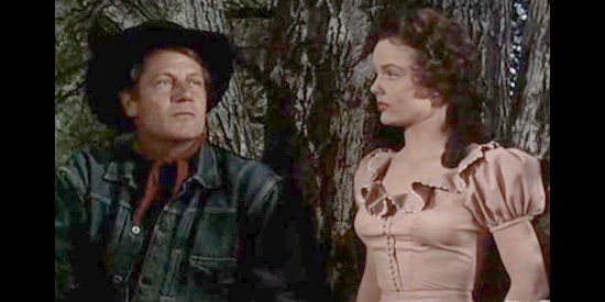 Joel McCrea as Chuck Conner discussing responsibilities with Della (Wanda Hendrix) in Saddle Tramp (1950)