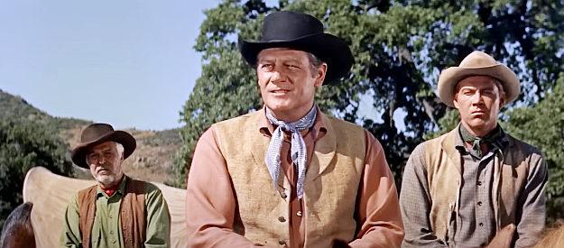 Joel McCrea as Ned Bannon, offering members of the wagon train help while they rest in The Tall Stranger (1957)