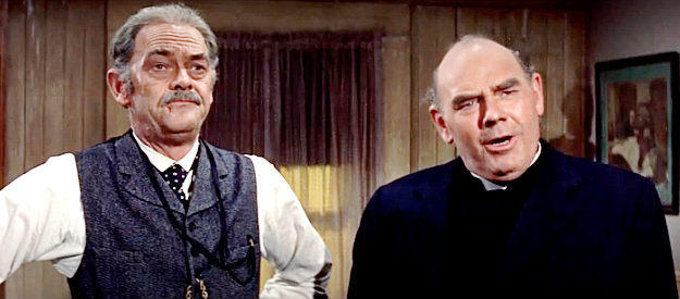 John McIntire as Doc Sam Tremaine and James Westerfield as Rev. Howard, trying to convince Bat to run for sheriff in The Gunfight at Dodge City (1959)