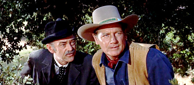 John McIntire as Sam Tremaine and Joel McCrea as Bat Masterson, new friends in The Gunfight at Dodge City (1959)