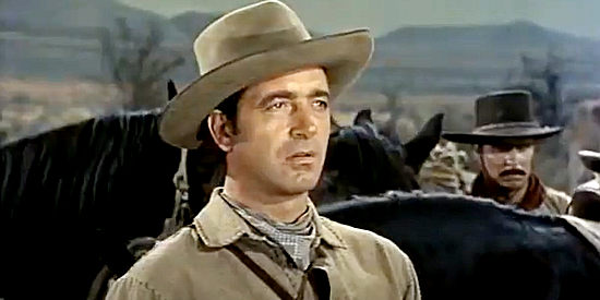 John Payne as Kirby Randolph, an Indian hater out to redeem his reputation as a trusted scout in Sante Fe Passage (1955)