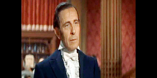 John Wengrab as Nicholas Cadiz, owner of the gambling house where Colby's father was killed in The Gambler from Natchez (1954)