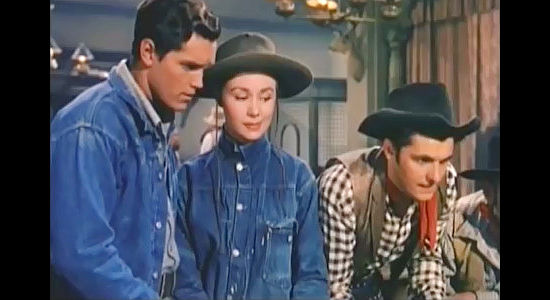 Johnny Colt (Jeffrey Hunter) and Rusty Blair (Mitzi Gaynor) look on as Tony Ballew (Keefe Brasselle) tries for a big score at the roulette wheel in Three Young Texans (1954)