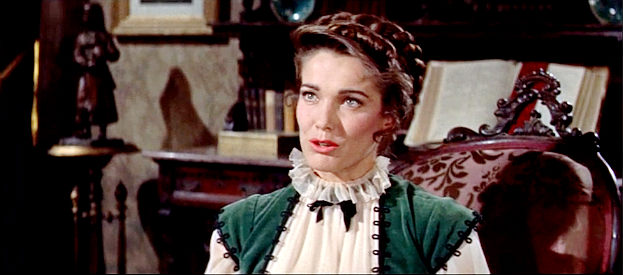 Julie Adams as Pauline Howard, the preacher's daughter Bat Masterson's brother was supposed to marry in The Gunfight at Dodge City (1959)