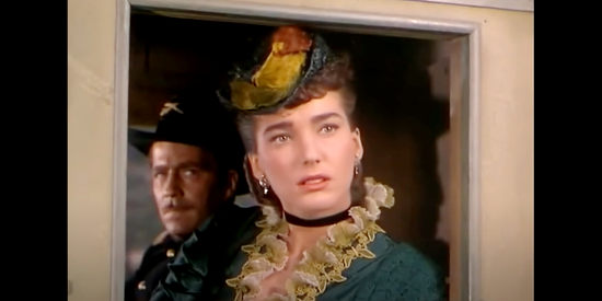 Julie Adams as Valerie Kendrick, heading West to meet the man she plans to marry in The Stand at Apache River (1953)