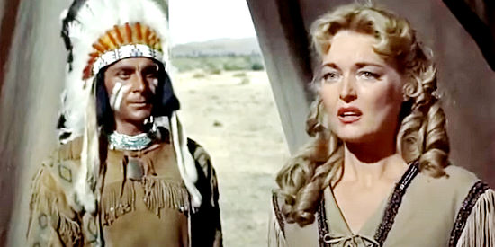 Karin Booth as Susan Hannah, balking as Black Cat (Steven Ritch) explains his plan to sell her in Seminole Uprising (1955)