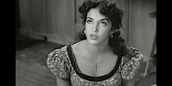 Katy Jurado as Mistania Figueroa, in love with Carl Miller, but afraid of losing him to Julia in San Antone (1953)