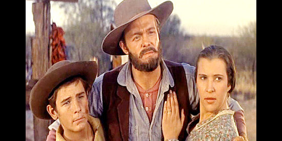 Kevin Hagen as farmer Clem Haney with his family, standing up against Bodeen in Gunsmoke in Tucson (1958)