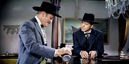 Kirk Douglas as Doc Holliday, rebuffing the advice of Wyatt Earl (Burt Lancaster) to move to a healthier climate in Gunfight at the O.K. Corral (1957)