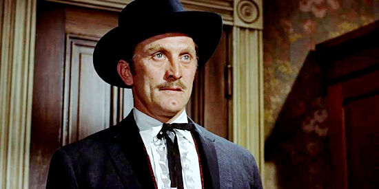 Kirk Douglas as Doc Holliday, trying to locate a wayward lady love in Gunfight at the O.K. Corral (1957)