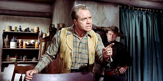 Lyle Bettger as Ike Clanton, laying out a plan for getting even with the Earps in Gunfight at the O.K. Corral (1957)