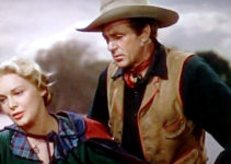 Madeleine Carroll as April Logan and Gary Cooper as Dusty Rivers in North West Mounted Police (1940)