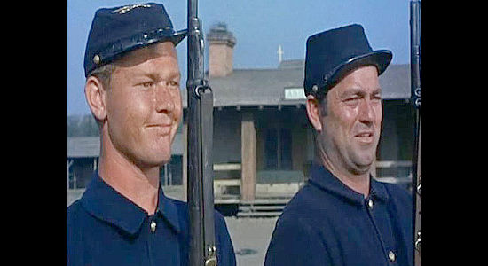 Martin Milner (left) as Pvt. Olie Larson, one of the men loyal to Lex Kearney as he tries to clear his name in Springfield Rifle (1952)