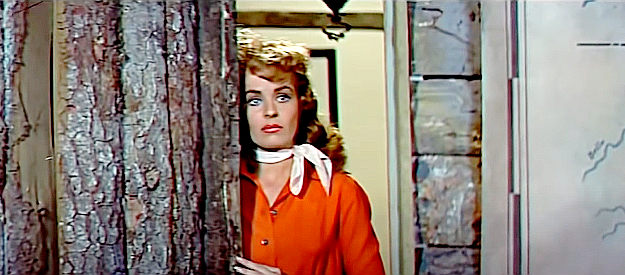 Mary Murphy as Kathy Howell, listening to her about to be former fiance arguing with his superiors again in Sitting Bull (1954)