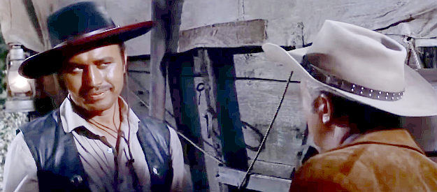 Michael Ansara as Zarata, hired trouble-maker for Mort Harperr (George N. Neise) in The Tall Stranger (1957)