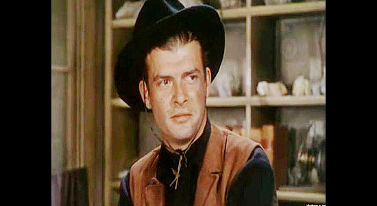 Michael Moore as Bill Taff, the fast gun on Jarboe's payroll, trying to figure out how he can get a split of the mining profits in Silver City (1951)