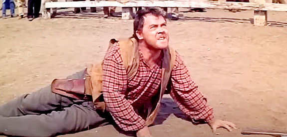 Mickey Shaughnessy as Jumbo McCall, an enforcer for Col. Stephen Bedford in The Sheepman (1958)
