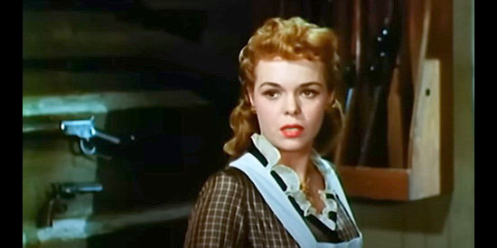 Nancy Gates as Caroline Webb, a witness to the shooting Tom Bannerman is arrested for in Stranger on Horseback (1955)