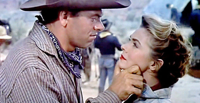 John Ireland as Clint McDonald, reunited with Lily (Joann Dru) in Southwest Passage (1954)