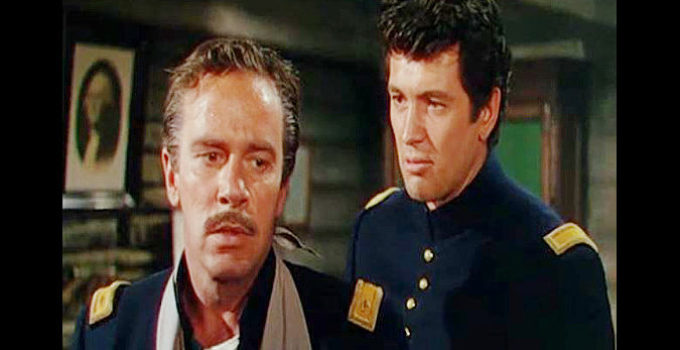 Richard Carlson as Maj. Harlan Degan and Rock Hudson as Lt. Lance Caldwell, disagreeing about Indian policy yet again in Seminole (1953)