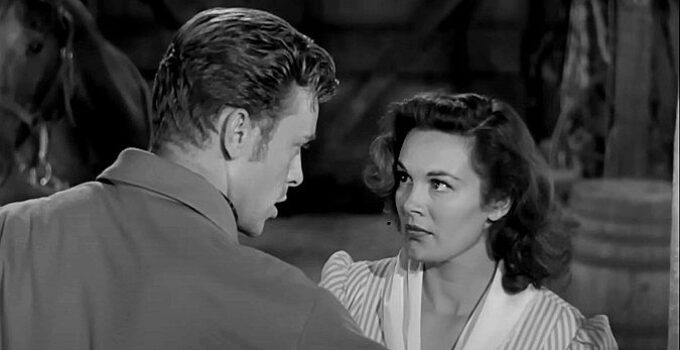 Skip Homeier as Clay Anderson and Patricia Medina as Peg Jarrett in Stranger at My Door (1956)