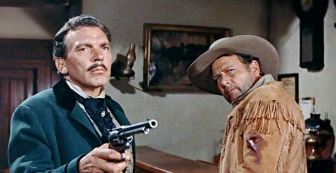 Walter Coy as Ben Townsend, longtime friend of Bat Masterson (Joel McCrea), defending him when he's wounded in The Gunfight at Dodge City (1959)