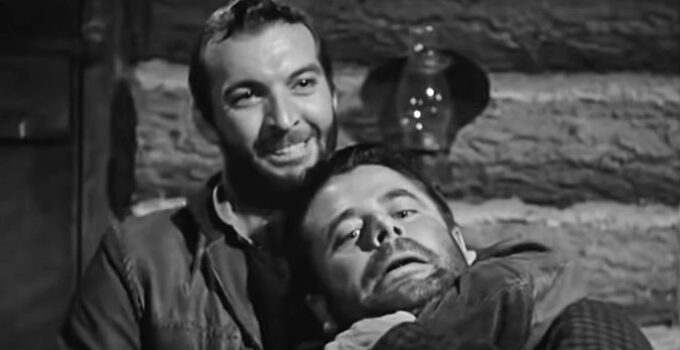 Zachary Scott as Johnny Greer with Jim Canfield (Glenn Ford) in a chokehold in The Secret of Convict Lake (1951)