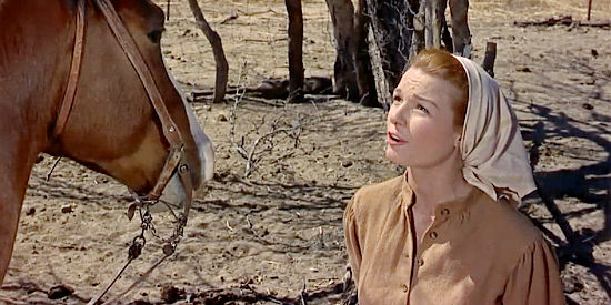 Patricia Livingston as Stella Leatham, explaining how she's now married in The Guns of Fort Petticoat (1957)