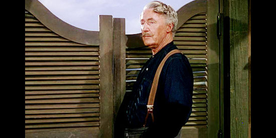 Paul McVey as Sam Grafton, owner of the general store and saloon where the ranchers and homesteaders clash in Shane (1953)