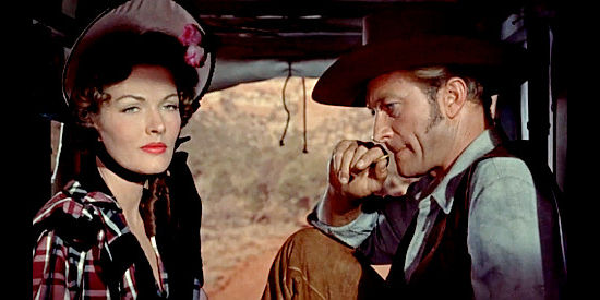 Paula Raymond as Max Gaines and Richard Denning as Jack Gaines, their relationship on the rocks because of his drinking in The Gun That Won the West (1955)