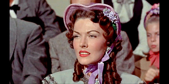 Paula Raymond as Max Gaines, disappointed to see her husband was unable to perform again because of hi sdrinking in The Gun That Won the West (1955)