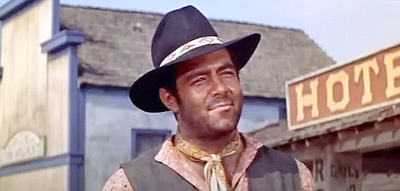 Pernell Roberts as Chocktaw Neal, the hired gun Col. Stephen Bedford brings to Powder Valley in The Sheepman (1958)