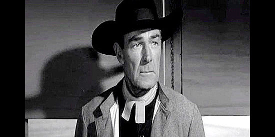 Randolph Scott as Buck Devlin, quickly identifying who's causing some of the trouble in Shoot-out at Medicine Bend (1957)