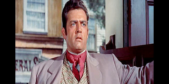 Raymond Burr as Jumbo Means, owner of a profitable gambling house until Owen Pentecost wins it from him in Great Day in the Morning (1956)