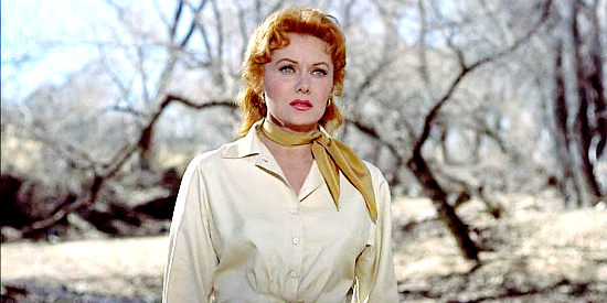 Rhonda Fleming as Laura Benbow, watching Wyatt ride off toward Tombstone against her wishes in Gunfight at the O.K. Corral (1957)