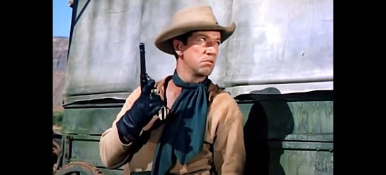 Richard Boone as Brett Manning, the fast gun Farraday has to rely on to transport the Gatling gun in The Siege at Red River (1954)