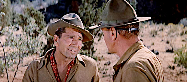 Richard Conte as Captain Milo Trubee, trying to blackmail Thorn with knowledge of how he hid while under enemy fire at Columbus in They Came to Cordura (1959)