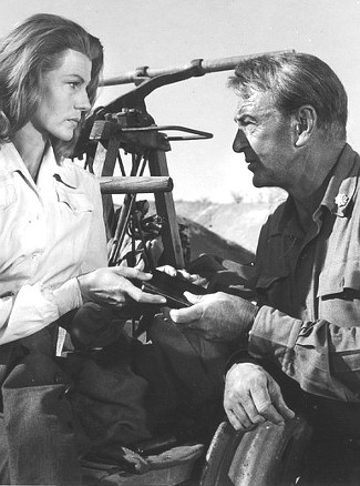 Rita Hayworth as Adelaide Geary and Gary Cooper as Maj. Thomas Thorn in They Came to Cordura (1959)