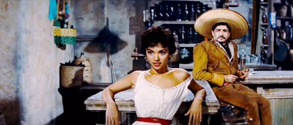 Rita Moreno as the saloon singer with Vicente (Victor Mendoza) looking on in Garden of Evil (1954)