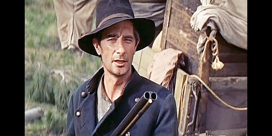 Royal Dano as Clay Ellison, the man who shows up determined to farm part of the valley in Saddle the Wind (1958)