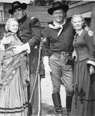 Sally Eilers as Annie Benson, Rob Cameron as Grif Holbrook, Wayne Morris as Barney Broderick and Kay Buckley as Kate Crocker in Stage to Tucson (1950)