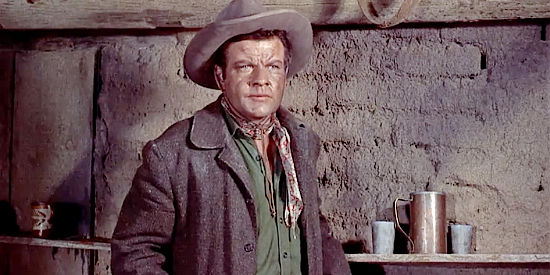 Sean McClory as Emmett Kettle, the cowardly drunk found hiding in the mission in The Guns of Fort Petticoat (1957)