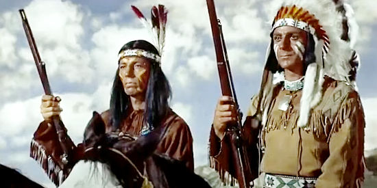 Seminole leaders High Cloud (Rus Conklin) and Black Cat (Steven Ritch) watch an attack unfold in Seminole Uprising (1955)