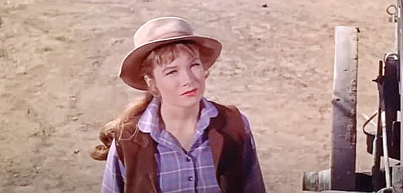 Shirley MacLaine as Dell Payton, a cattleman's daughter baffled by Jason Sweet in The Sheepman (1958)