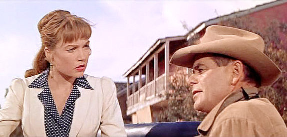 Shirley MacLaine as Dell Payton and Glenn Ford as Jason Sweet, engaged in another verbal jousting match in The Sheepman (1958)
