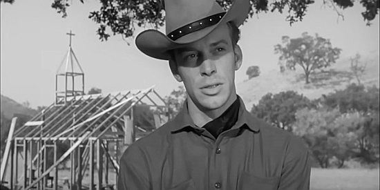 Skip Homeier as Clay Anderson, an outlaw on the run and reluctant to accept Hollis Jarrett's religion in Stranger at My Door (1956)