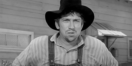 Slim Pickens as Ben Silas, the man who turns over his wild stallion to the Jarrett family in Stranger at My Door (1956)