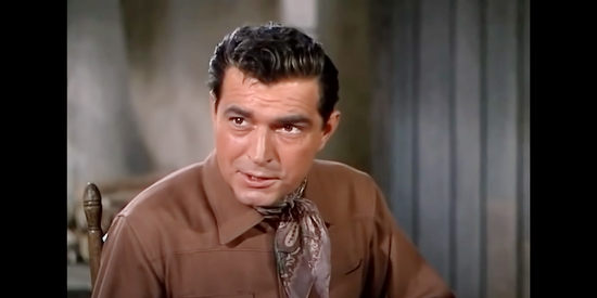 Stephen McNally as Lane Dakota, determined to take a prisoner named Greiner to justice in The Stand at Apache River (1953)